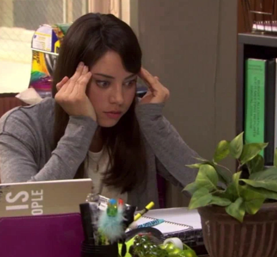Aubrey Plaza with a stressed expression