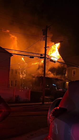 Four displaced, two hurt after fire spreads to neighboring home in New ...
