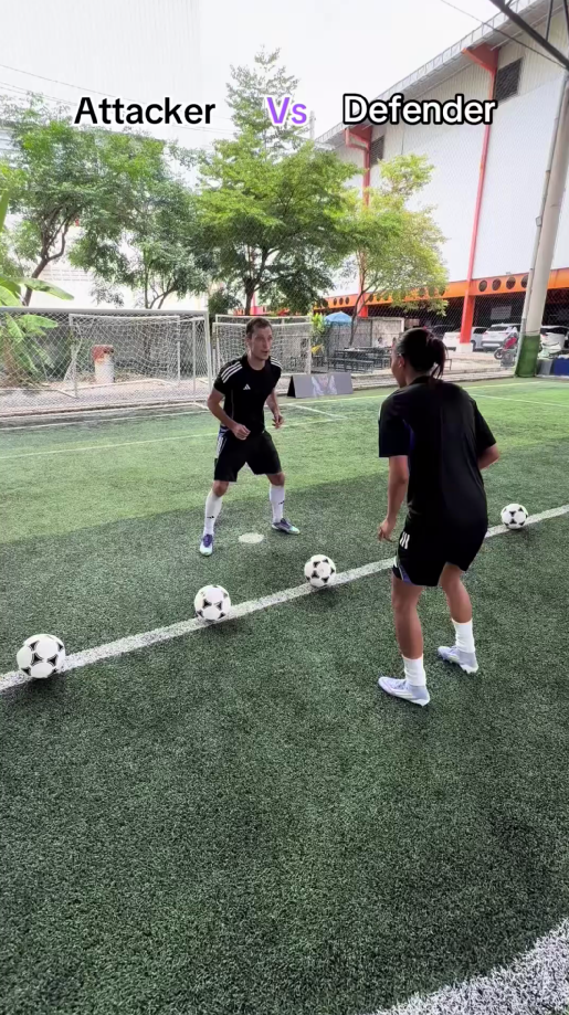 A fierce football battle between attackers and defenders