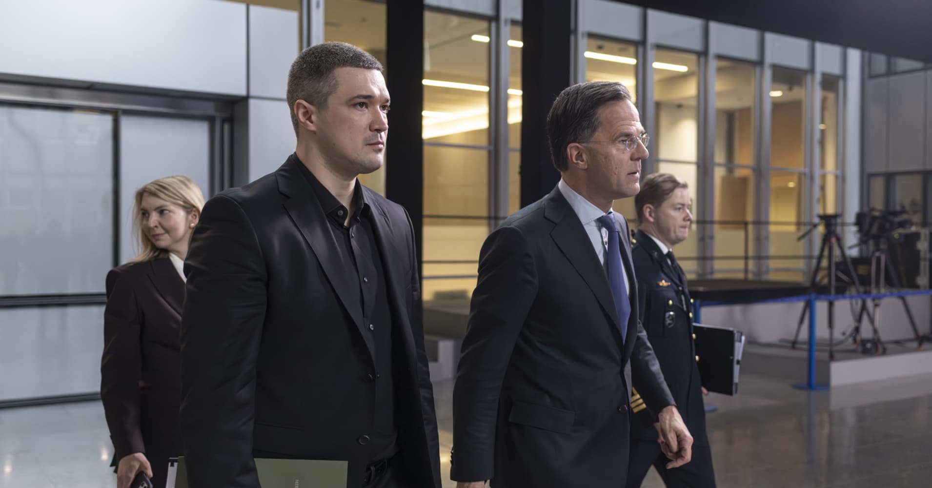 Mark Rutte (R), Secretary General of NATO, and Mykhailo Fedorov (L), Minister of Defence of Ukraine, walk to a joint meeting on February 12, 2026 in Brussels, Belgium.