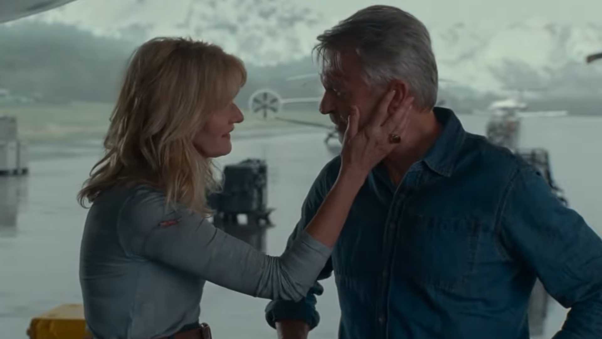 Ellie and Alan embrace at the end of Jurassic World Dominion