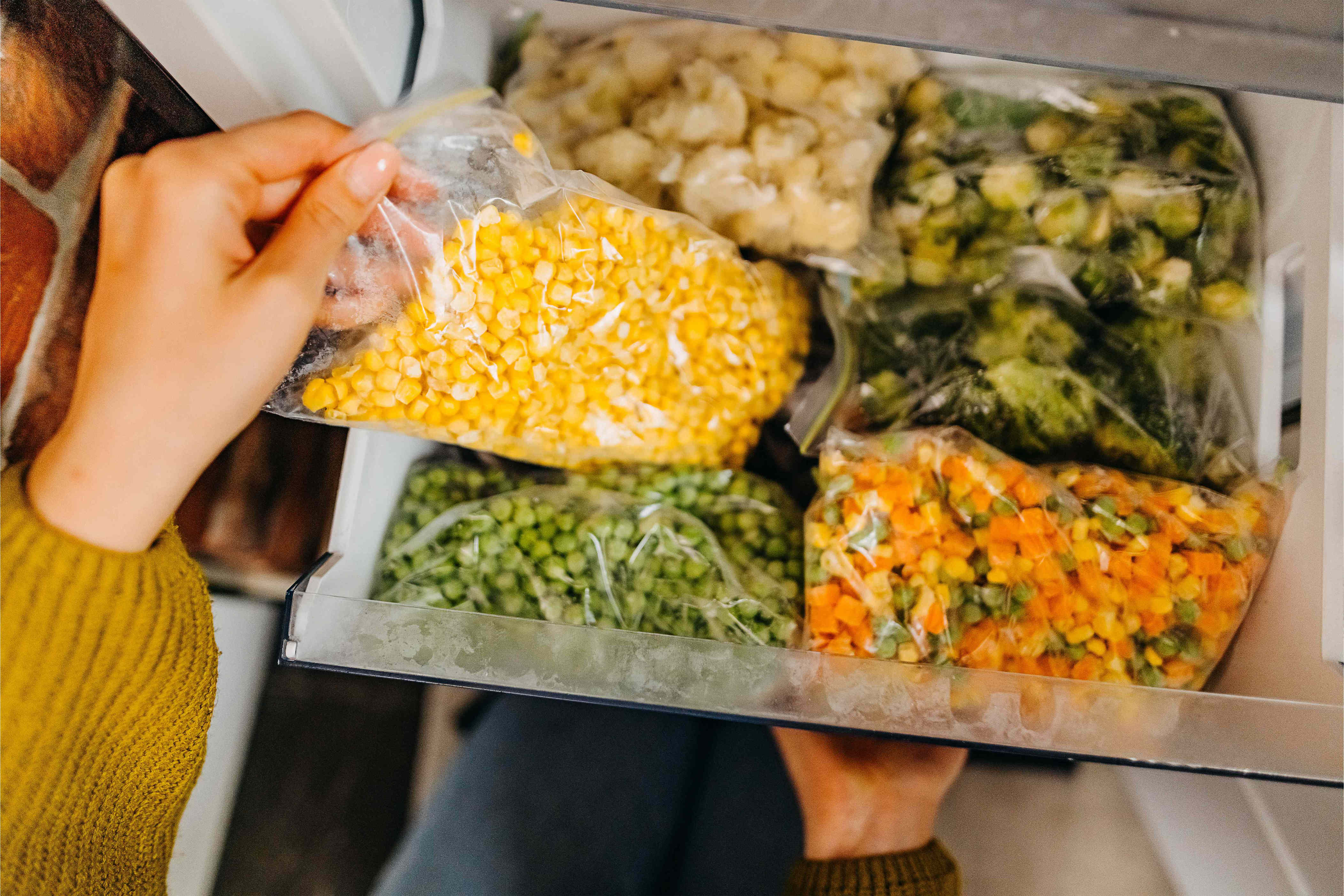 No more freezer burn—shoppers say these stackable freezer bins made an 'unbelievable difference'