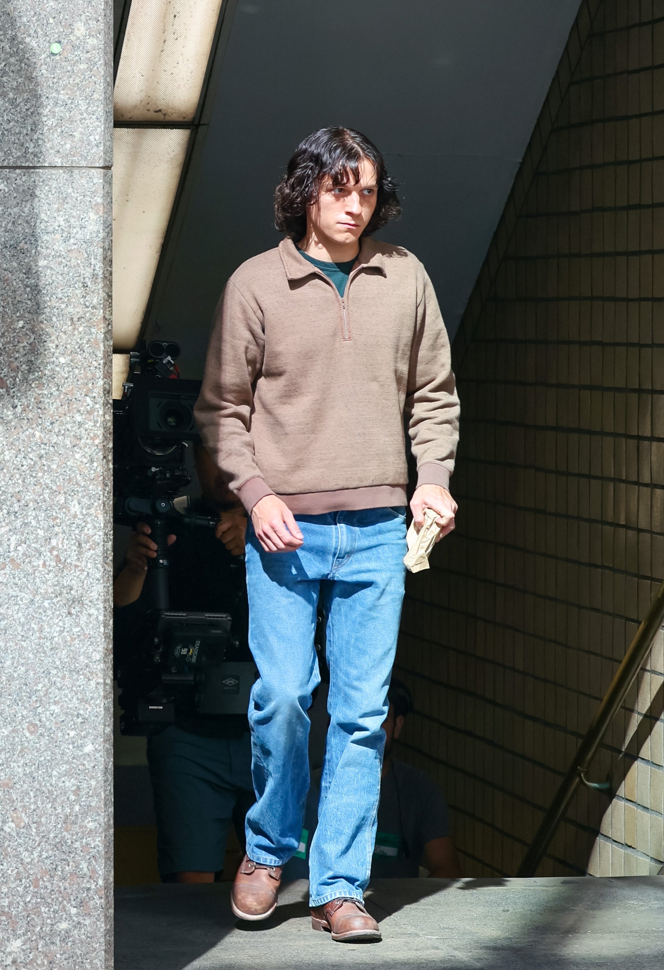 Tom filming "The Crowded Room"