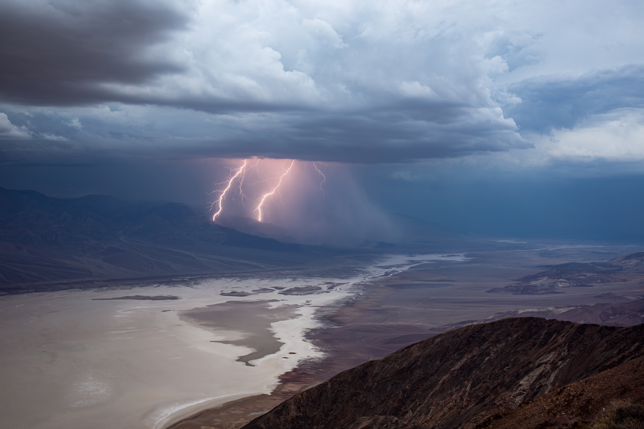 Scenic view of a lightning storm over Badwater Basin from Dante's View in Death Valley National Park, California, USA.