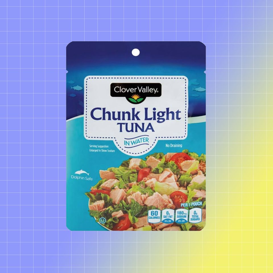 Clover Valley Chunk Light Tuna in packaging against a gradient background