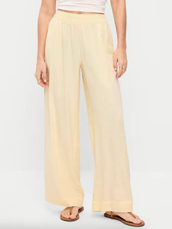 model wearing the pants in yellow