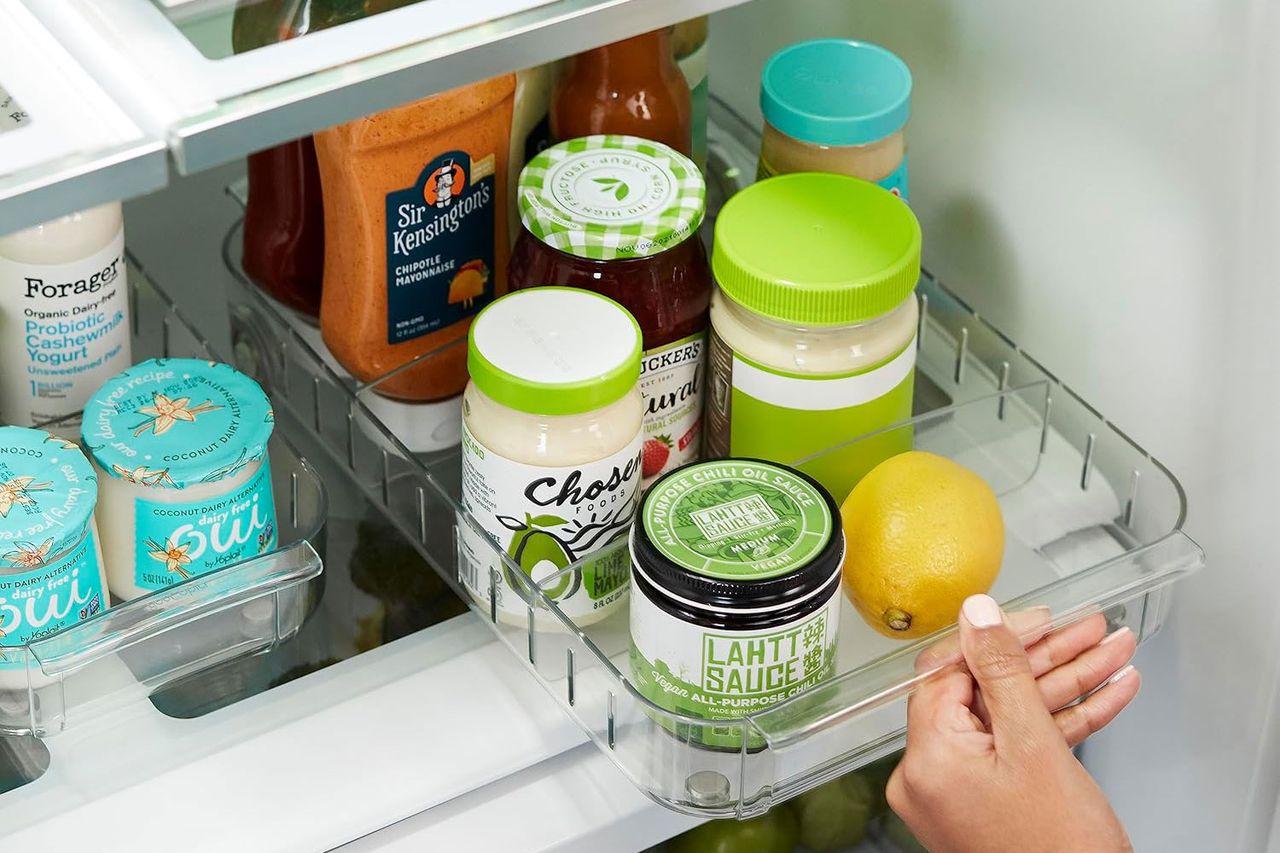 person opening fridge container