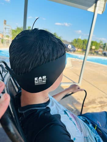 Reviewer's teen wearing a black swimming headband