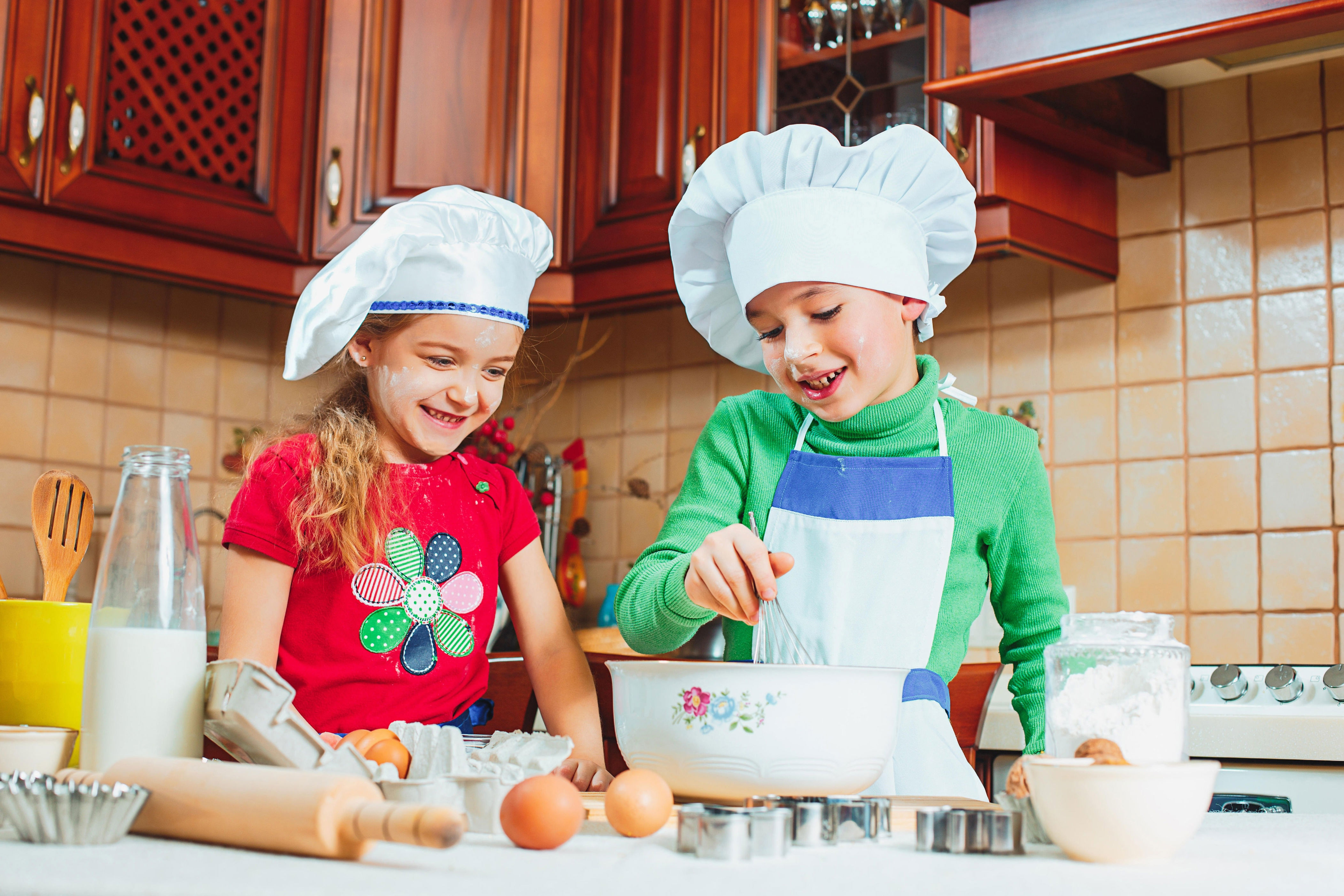 Giving children a task such as preparing a family meal can stave off boredom. (Alamy/PA)