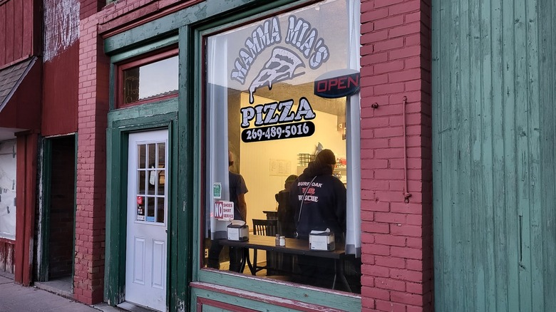 red brick building housing Mama Mia's Pizza in Burr Oak, Michigan