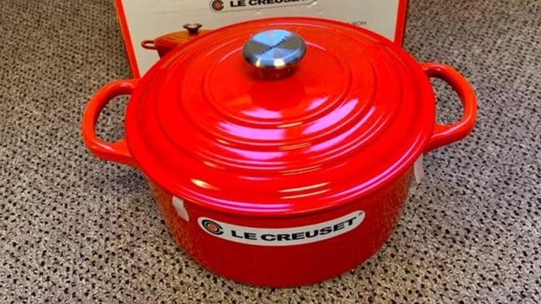 A medium round Le Creuset Dutch oven in Coral