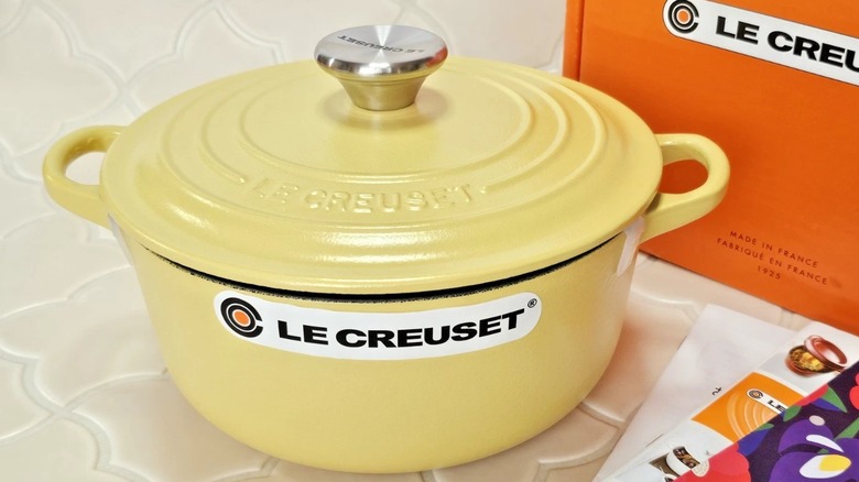 A large round Le Creuset Dutch oven in Mimosa