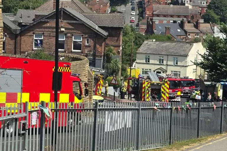 Casualty taken to hospital after fire leads to police cordon outside ...