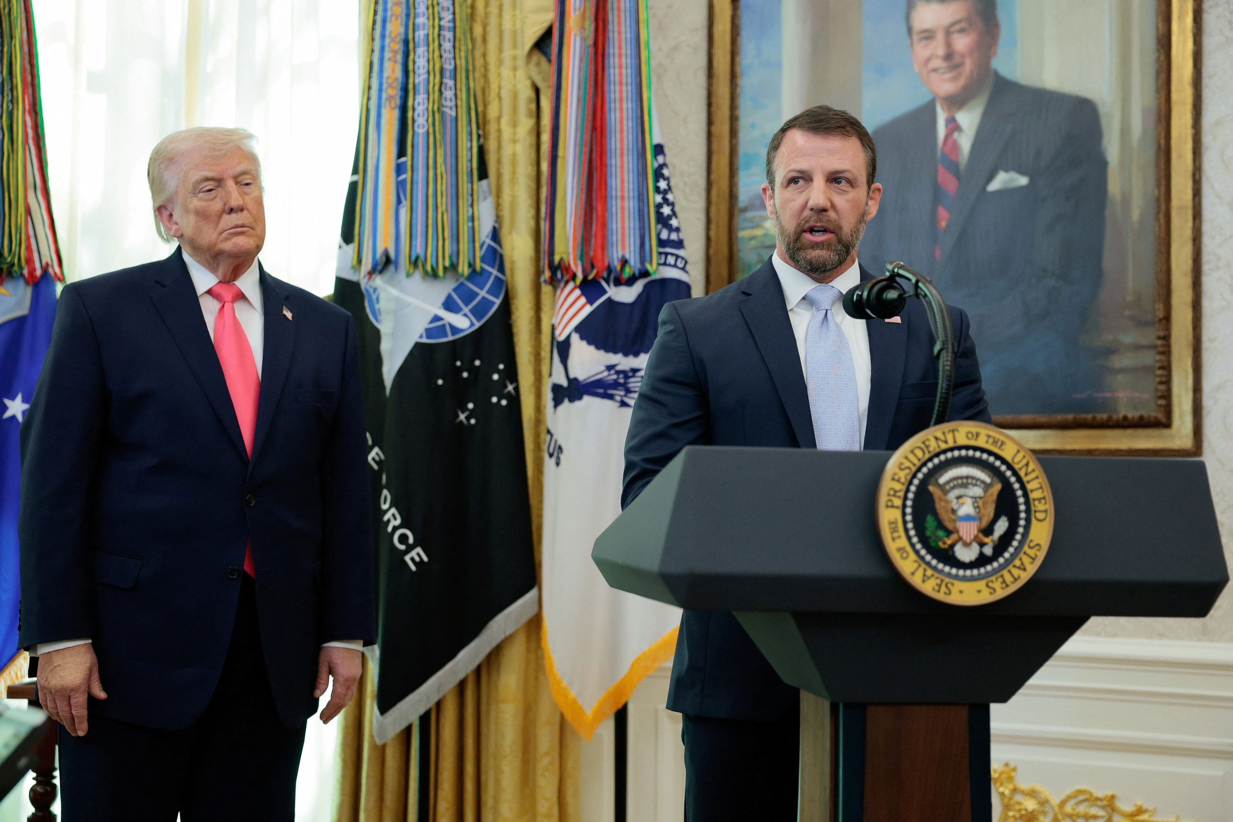 There are conflicting reports on whether Markwayne Mullin received White House approval before announcing the suspension of ICE traffic stops. / Evan Vucci/Reuters