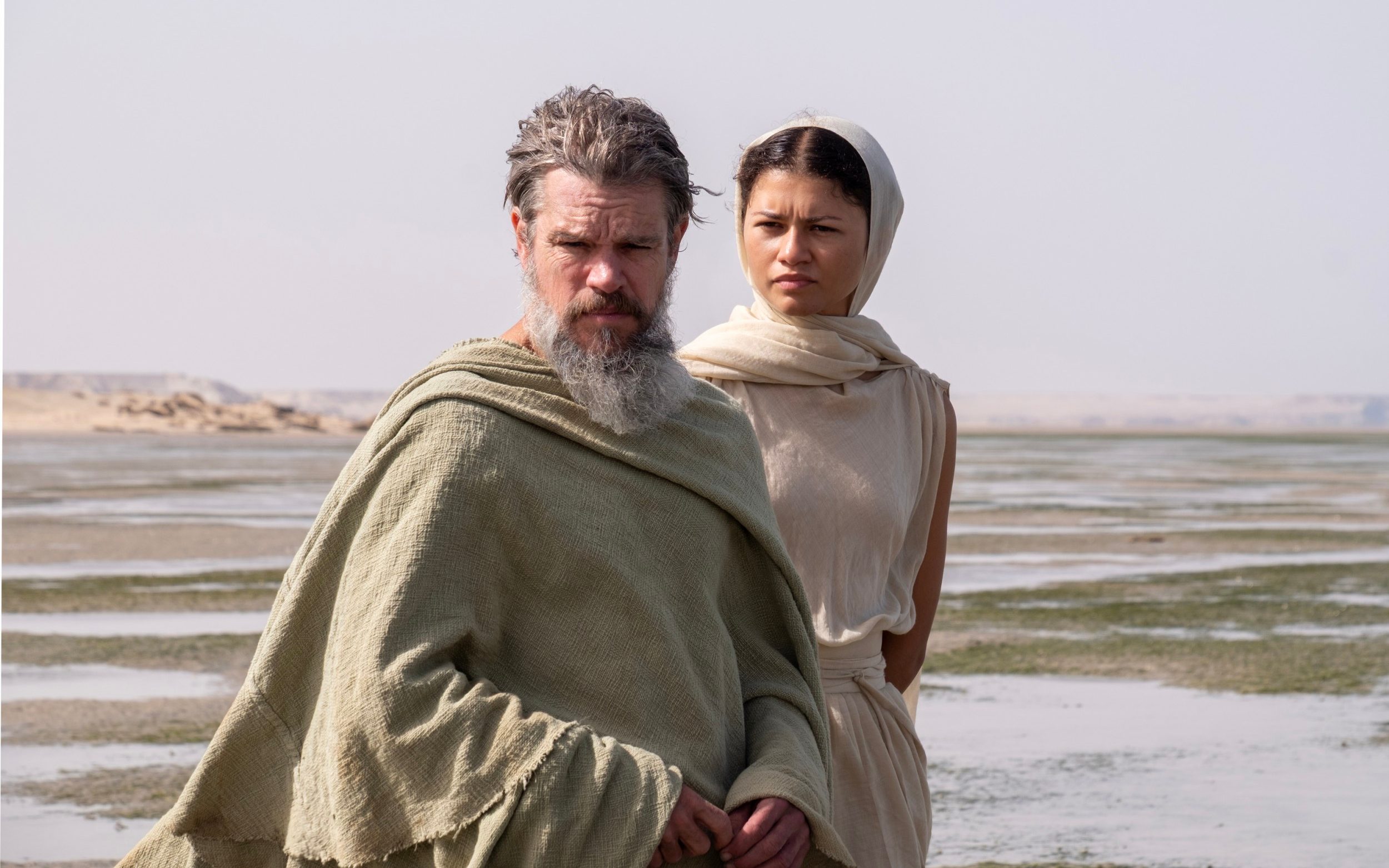 Film still from The Odyssey. Pictured: Matt Damon as Odysseus and Zendaya as Athena.