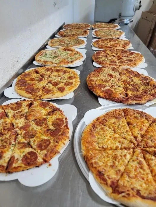 Pizza for pythons: Florida restaurant owner gives away free pies in ...