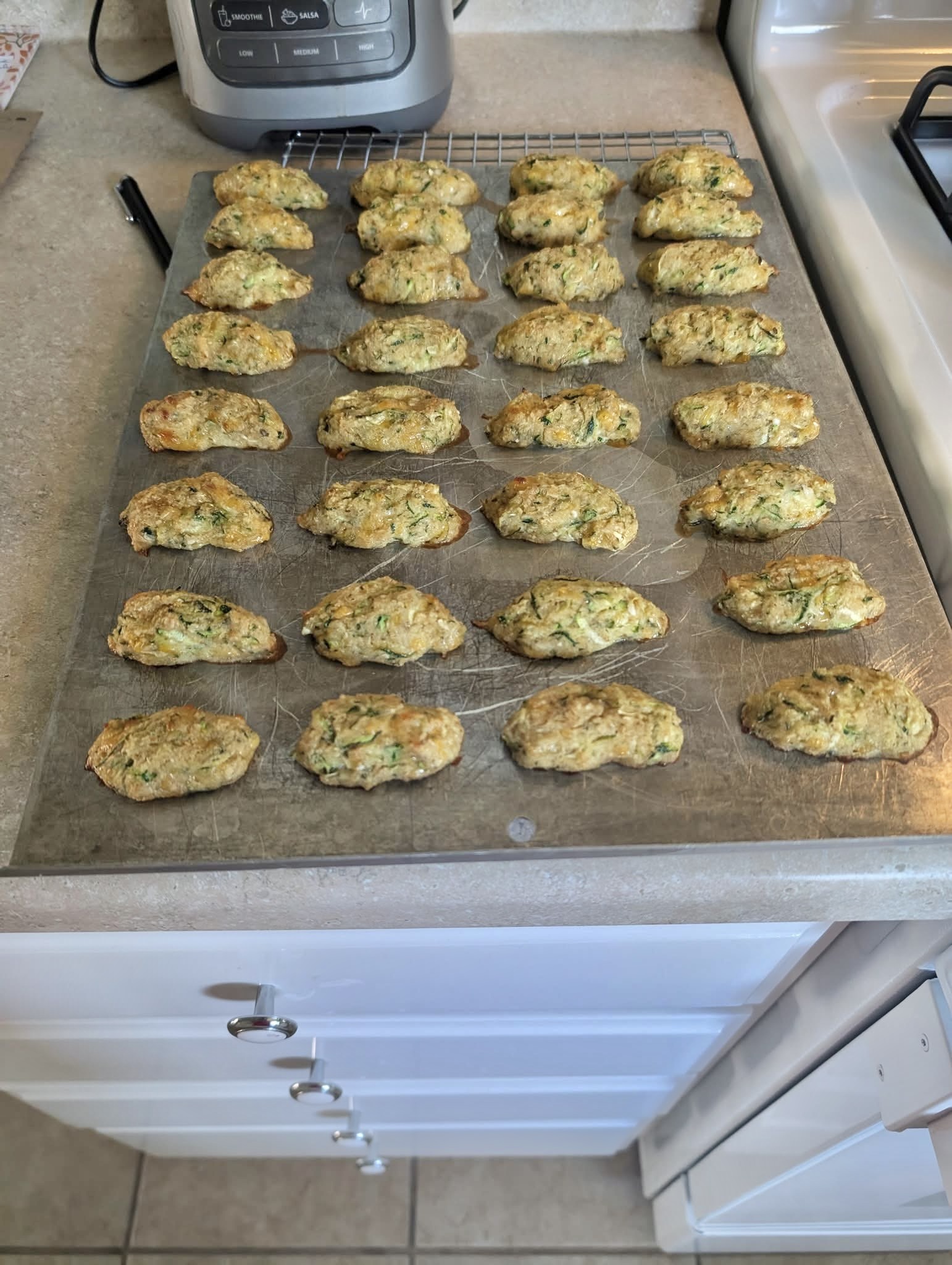 zucchini tots 1 point I made a double batch of zucchini tots today. The recipe is from Skinny Taste. They are really good. If you make 16, they are 1 point for 2. ingredients