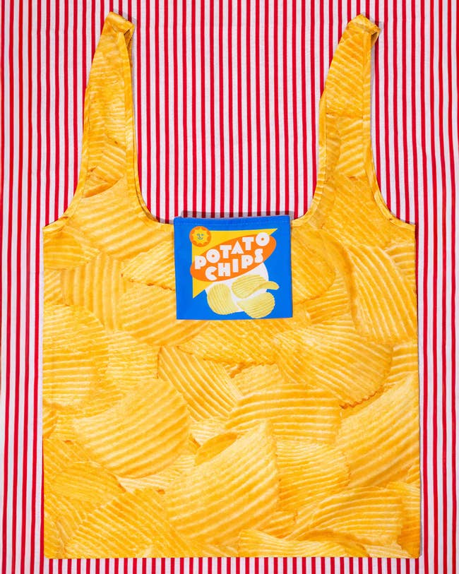 Reusable bag with a potato chips print and a mock chips packaging