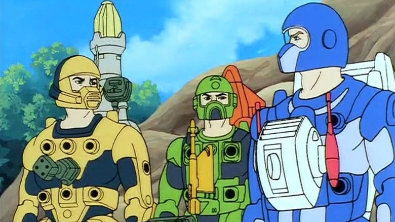 The three centurions in full gear looking at each other