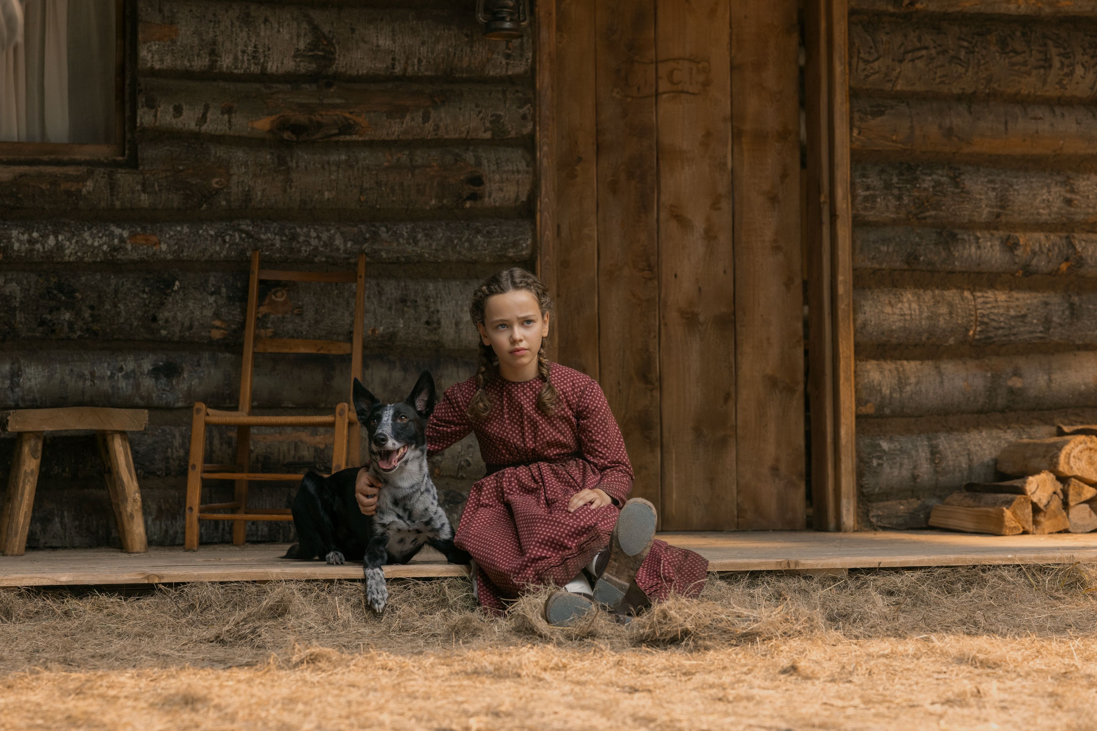 Alice Halsey as Laura Ingalls in Netflix’s Little House on the Prairie. Jack the dog is played by a handful of canine actors: “We had quite a few Jacks, because all these dogs do different things for us,” executive producer Rebecca Sonnenshine said.