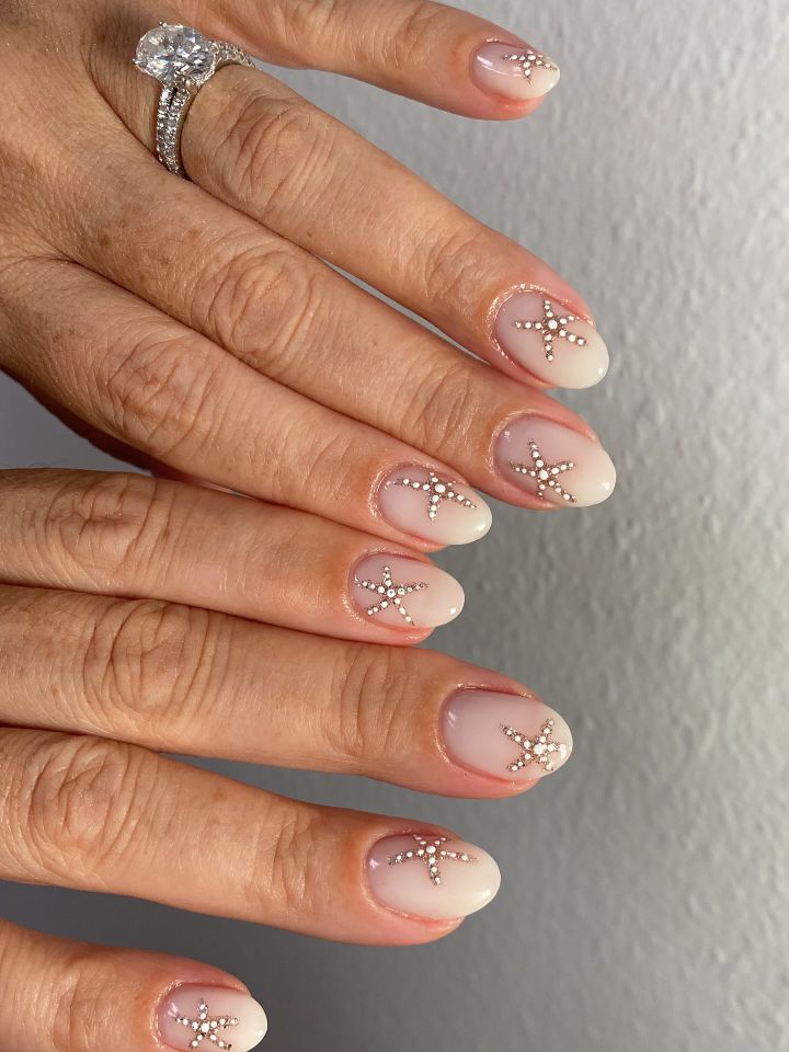 Milky white nails with starfish
