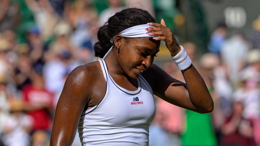 Coco Gauff laughs during her match at Wimbledon.