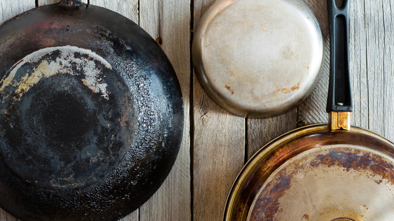Turn old cooking pans into charming kitchen decor with this genius DIY