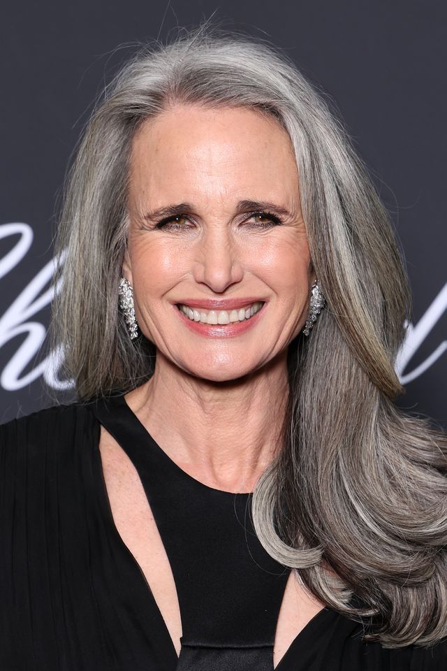 Andie MacDowell smiling at an event