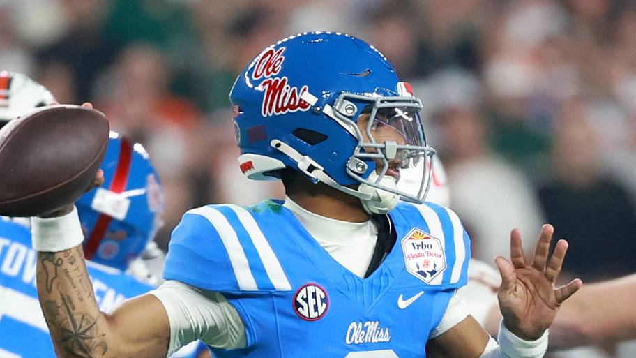 Mississippi Rebels quarterback Trinidad Chambliss drops back to pass.