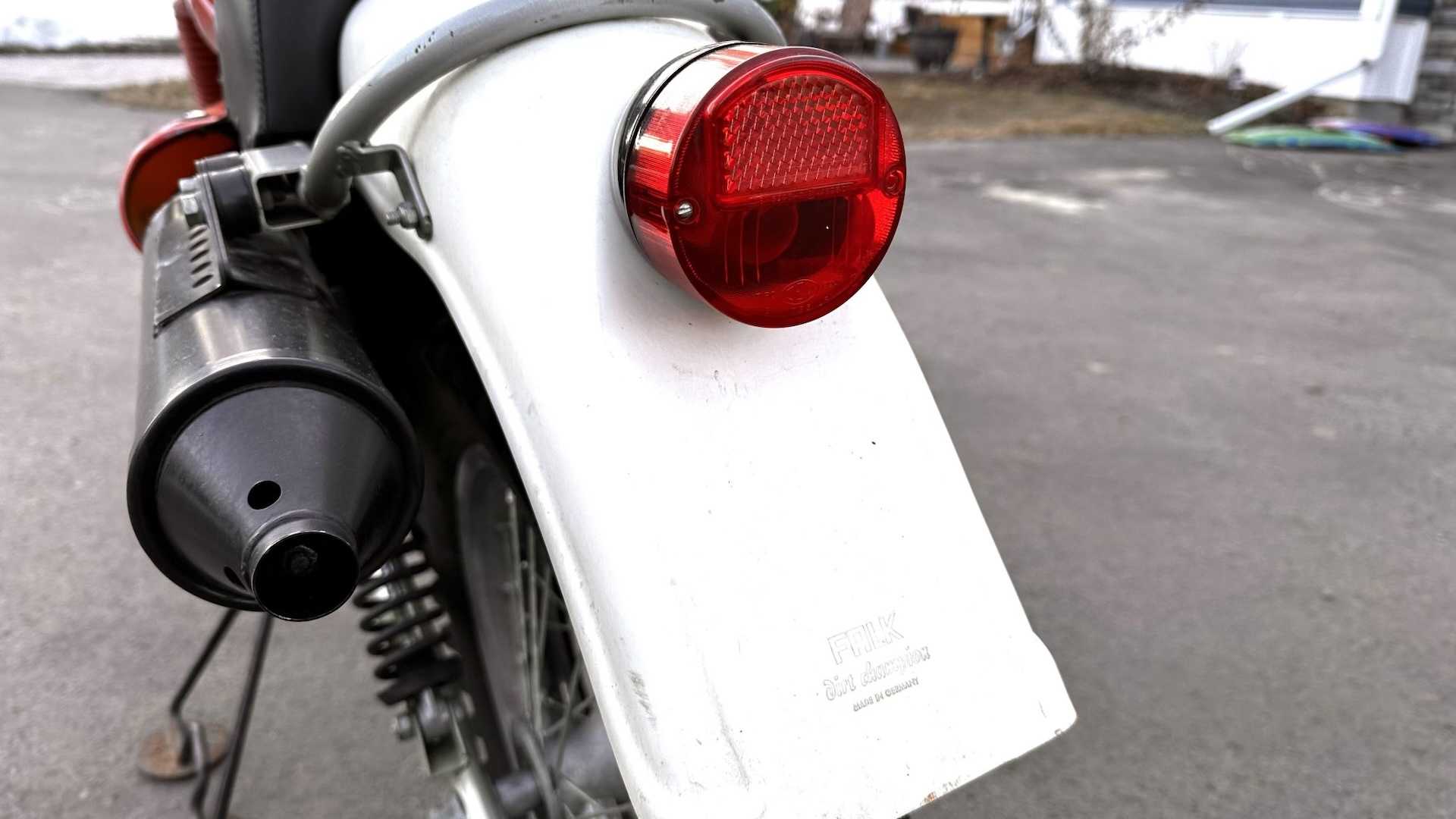 Tail light on the rear fender of a vintage motorcycle