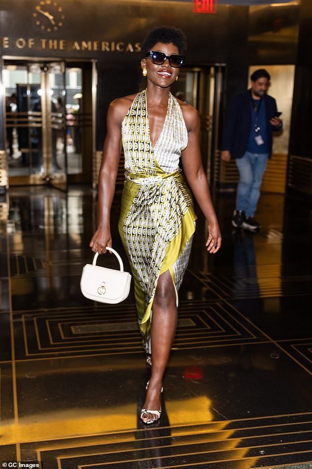 Lupita Nyong'o has won rave reviews for her performance as Helen of Troy in The Odyssey, and she couldn't hide her smile as she stepped out in New York on Thursday