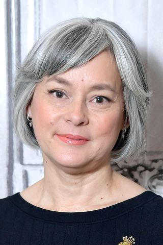 Meg Tilly posing for a photo