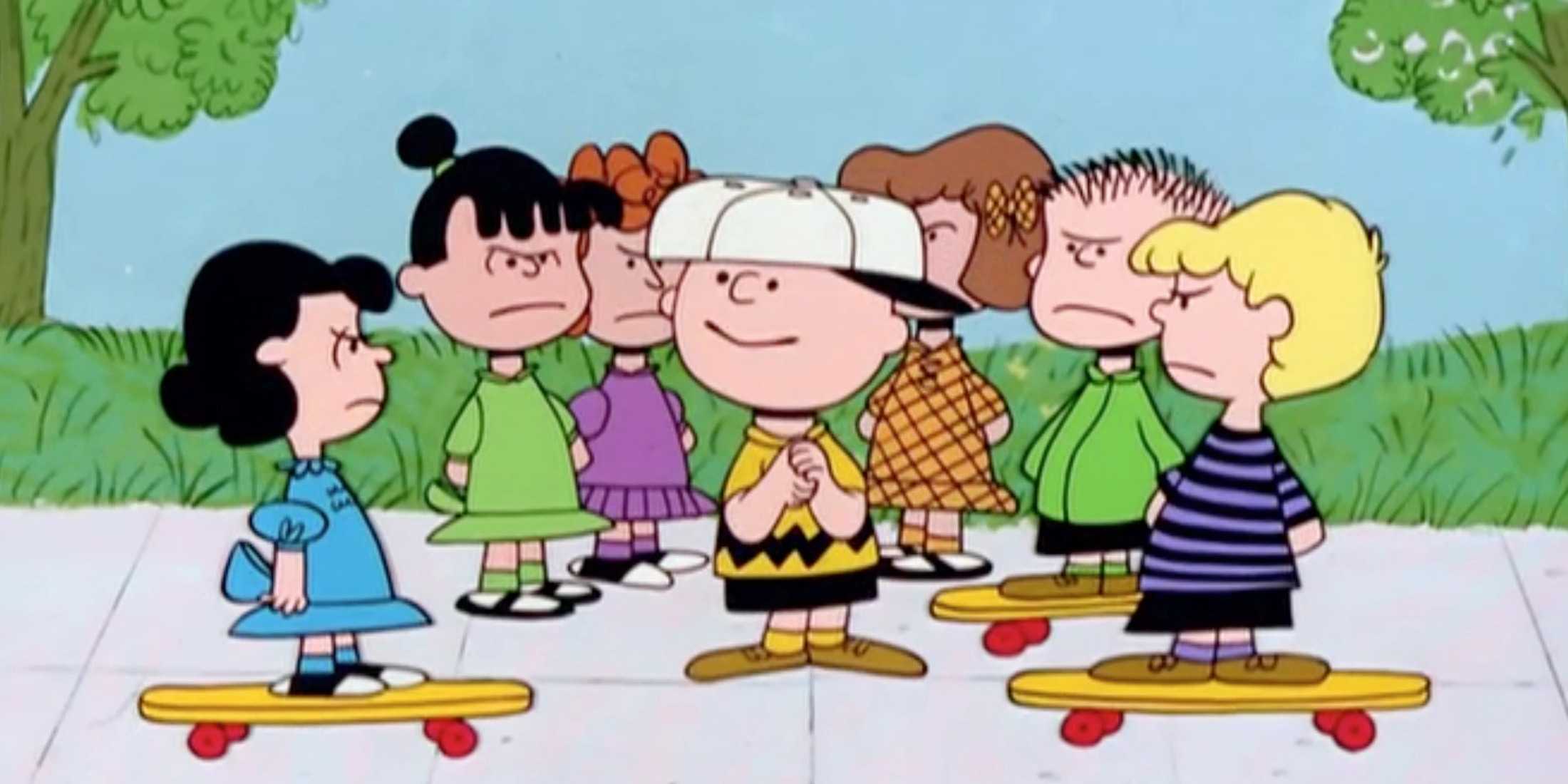 Charlies friends surround him while looking angry in Charlie Brown's All Stars