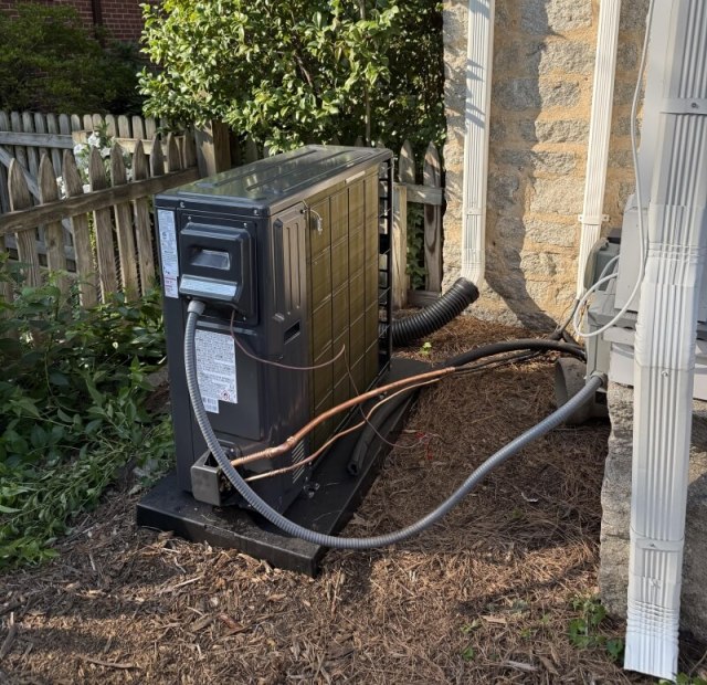 Heat wave AC replacement leaves homeowner eyeing a 'backward' outdoor unit and exposed copper