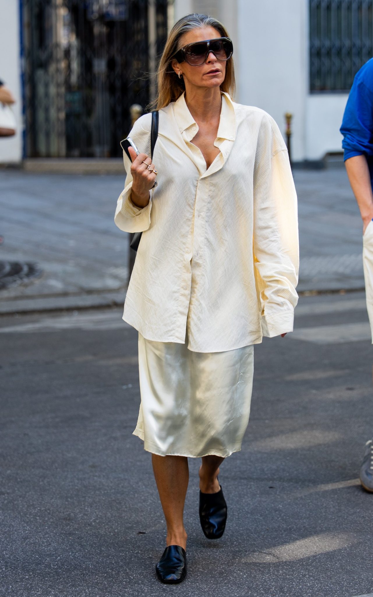 A guest wears creme white blouse, silk skirt outside LGN during Day Four of Paris Fashion Week in June 2026