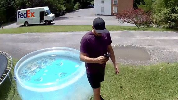 'I needed that!' FedEx driver attempts to play it cool after tumbling ...