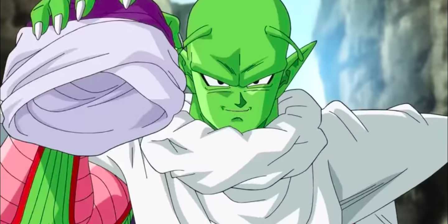Piccolo gives a cocky grin as he starts to remove weighted clothing in Dragon Ball Super.