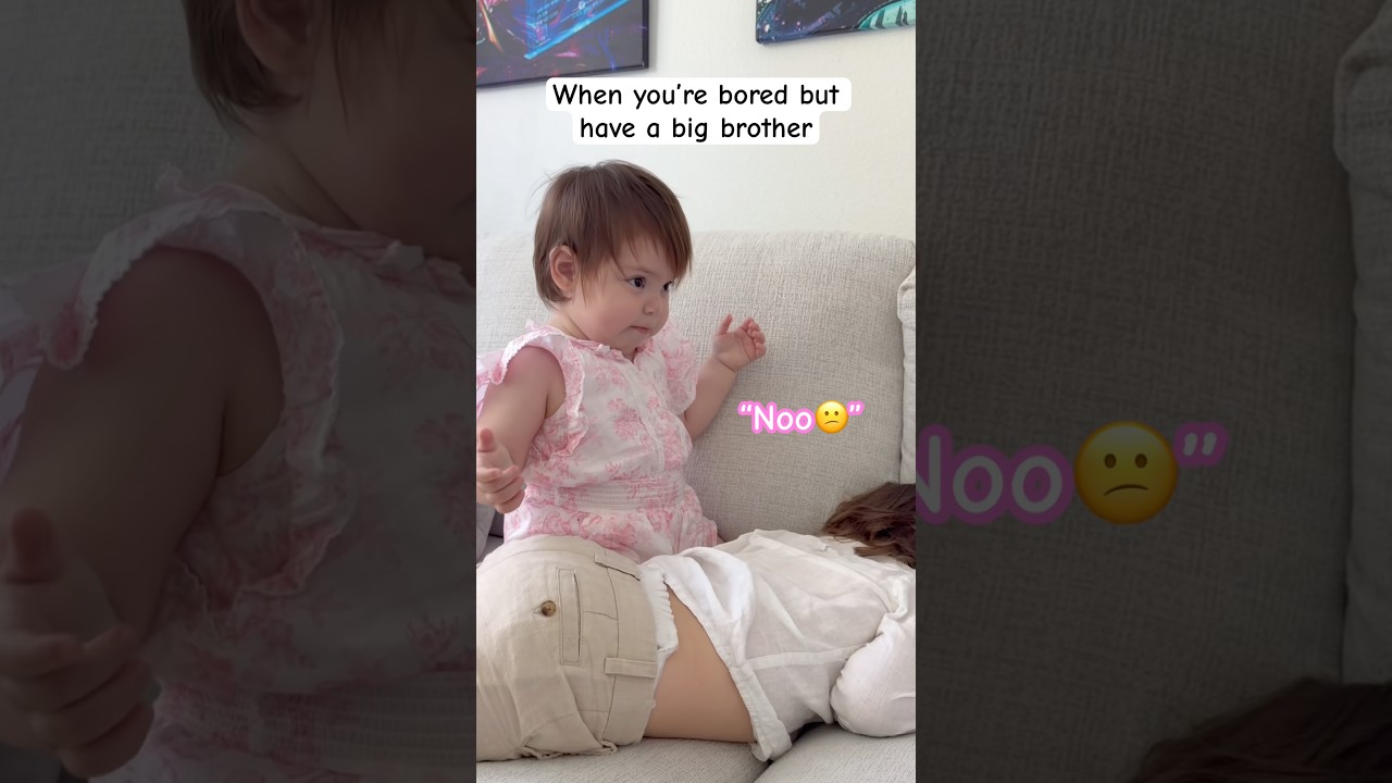 Adorable toddler tries everything to wake up his napping brother