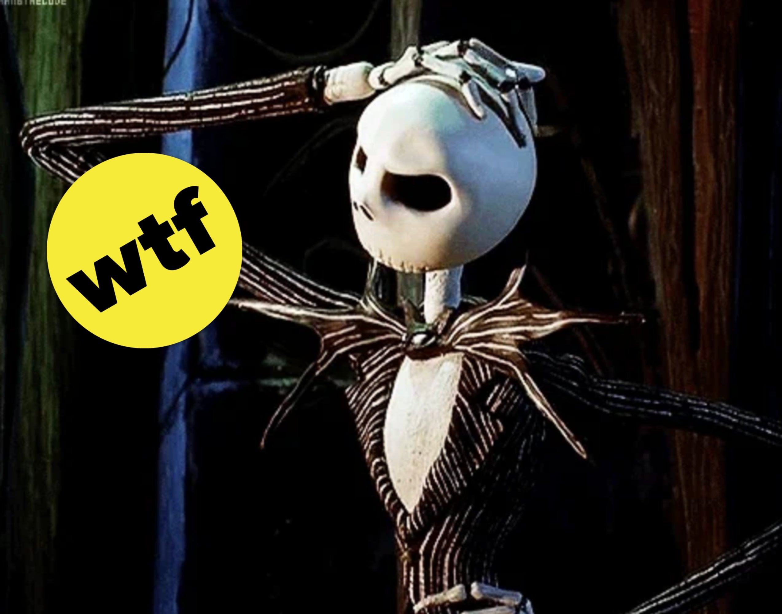 Animated skeleton character, Jack Skellington, in suit with bat bow tie, standing in a thoughtful pose
