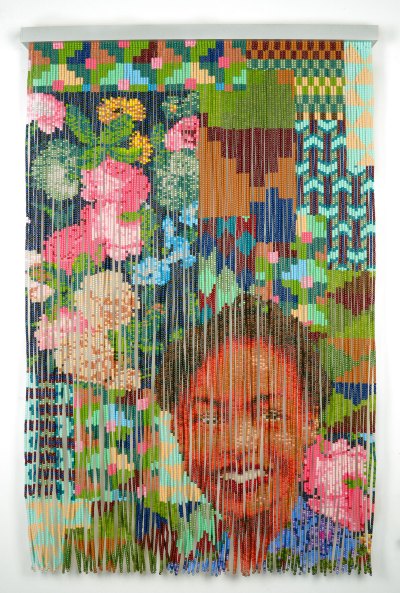 A beaded portrait of a Black woman with a mostly floral background.