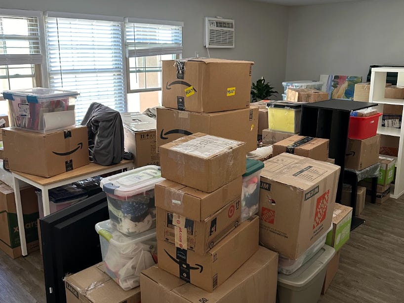 Piles of boxes in the writer's house as she prepares to move.