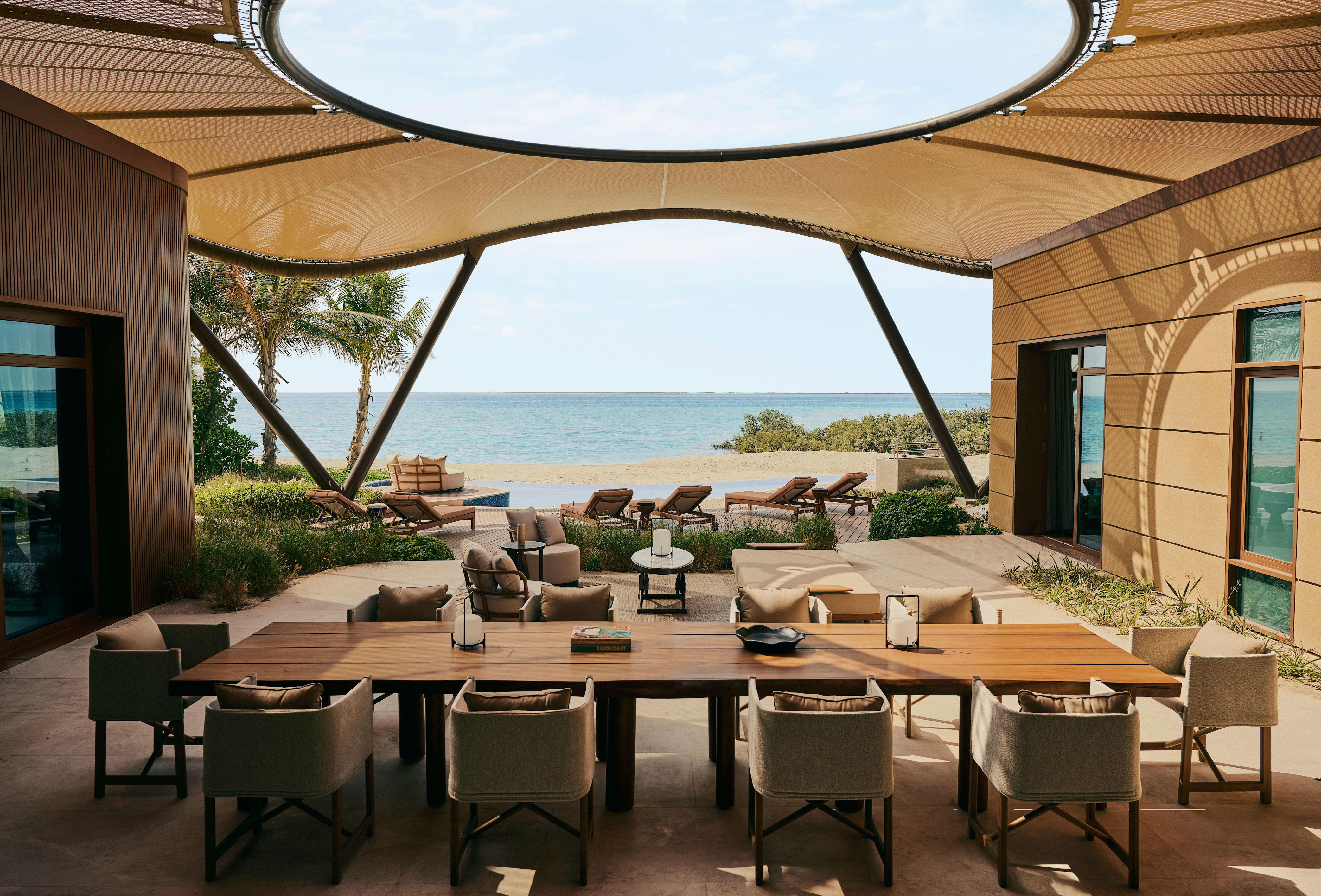 A courtyard lounge area at the Four Seasons Resort Red Sea by Meyer Davis. Photo courtesy of Four Seasons Resort and Residences Red Sea at Shura Island