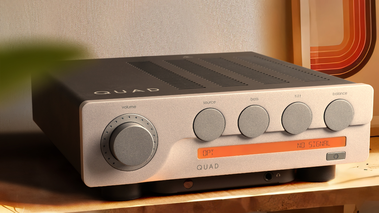 Quad 3 integrated amp on wooden shelf