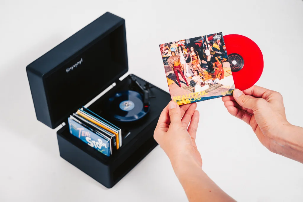 These tiny records now have their own miniature record player