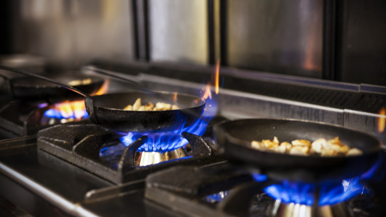 Pans on a commercial-grade gas stove