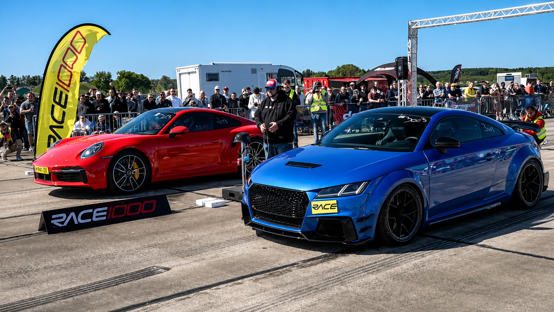 Intense drag race between Audi TT and Porsche 911