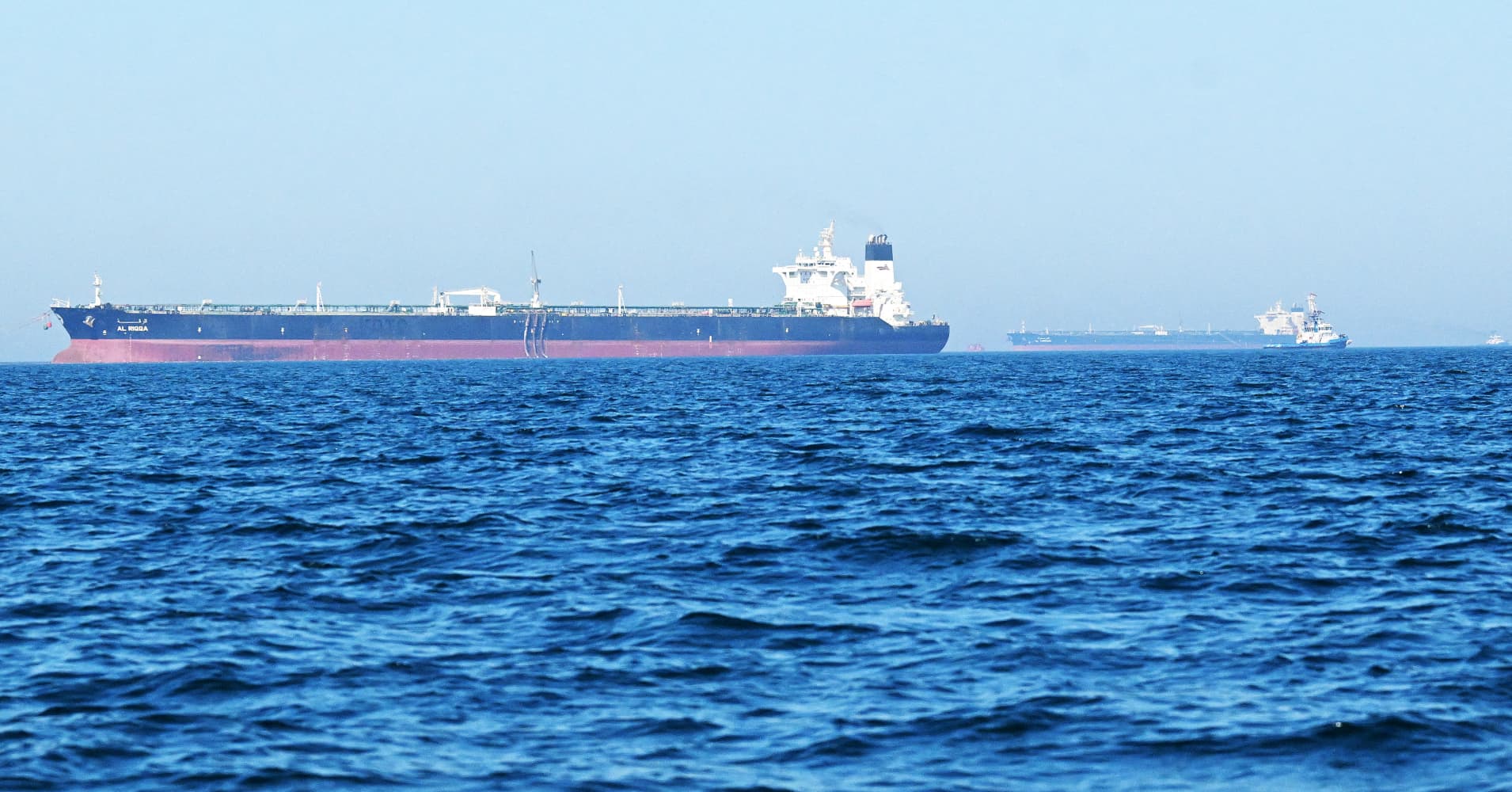 Oil prices fall as investors weigh falling demand against Middle East tensions