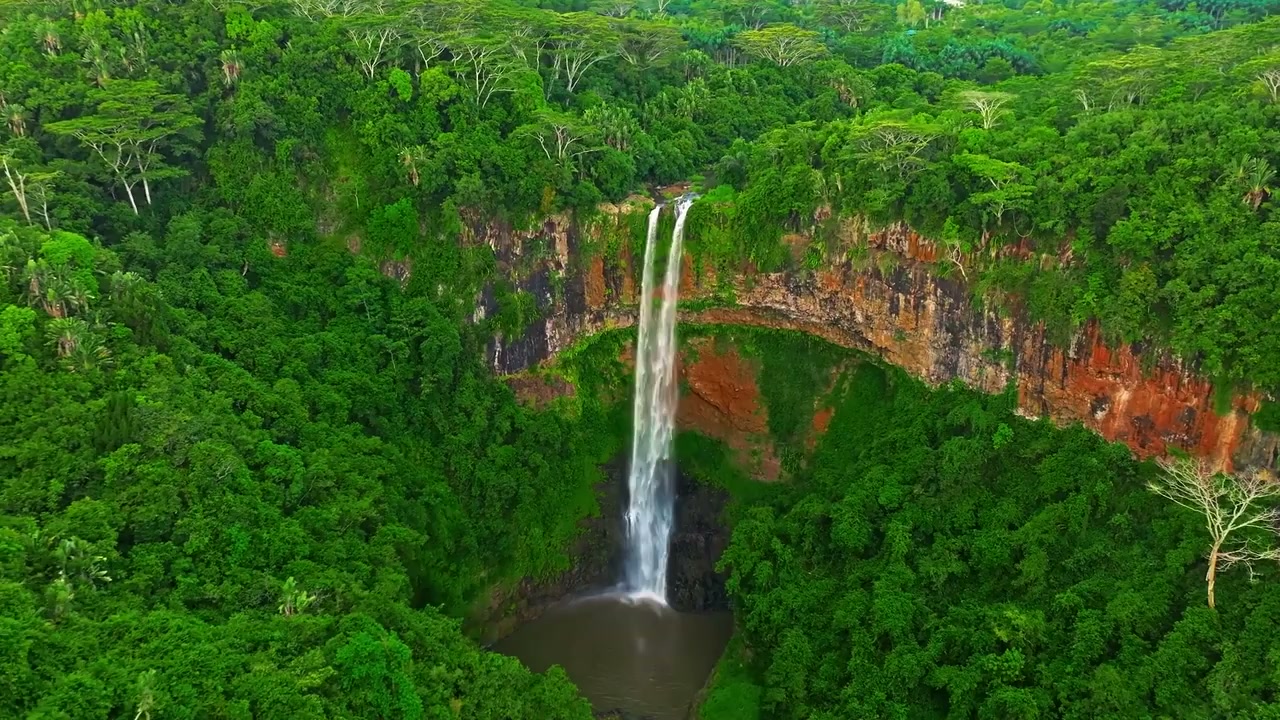 Chamarel, Mauritius: Drone glides over Seven Colored Earth