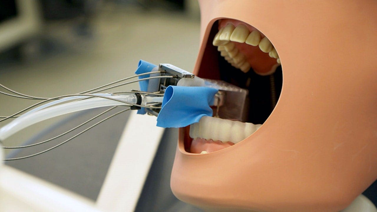 University of Basel researchers are developing MIR, a tiny dental robot designed to help prepare teeth for crowns with digital precision.
