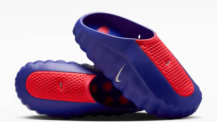 Side view of the Nike Mind 001 AMP 'Indigo Burst and Hyper Punch' colorway.
